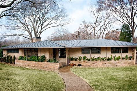 metal roof over brick ranch house|ranch style exterior walls.